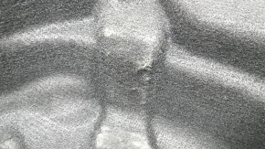 The Audi A6 C8 19-25 trunk liner is worn and torn.