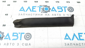 The front right lower door seal for an Audi A6 C8 19-21 has broken fasteners.