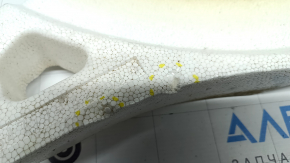 The foam under the spare tire of a Toyota Venza 21-24 is crushed.