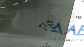 Rear left door glass of Audi Q5 80A 18-24 tinted, scratches