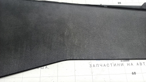 Mazda 3 19-26 4D black center console trim, lower right side, Japan built, scratches