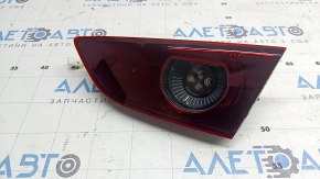 Right inner trunk lid light for Mazda 3 19-22 4d type 1, polished, missing glass fragment