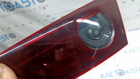 Right inner trunk lid light for Mazda 3 19-22 4d type 1, polished, missing glass fragment