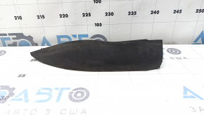 The left front bumper mudguard of an Audi A4 B9 17-25 is worn and scratched.