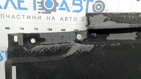 The left underbody protection of the Audi A4 B9 17-25 is worn out.