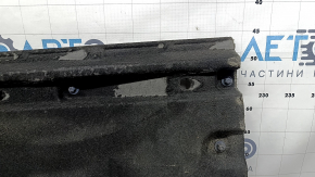 The left underbody protection of the Audi A4 B9 17-25 is worn out.