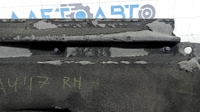 The right underbody protection of the Audi A4 B9 17-25 is worn and broken.