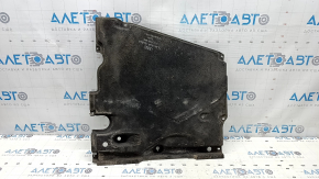 The rear right underbody protection of the Audi A6 C8 19-25 is torn from the fastening.