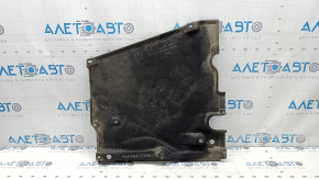 The rear right underbody protection of the Audi A6 C8 19-25 is torn from the fastening.