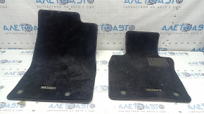 Set of black fabric floor mats for Mazda 3 19-23, ready for cleaning