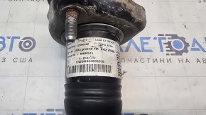 Rusty rear right shock absorber assembly for a Jeep Patriot 11-14.