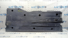 Left underbody protection for VW Jetta 19-26 is worn and dented.