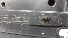 Left underbody protection for VW Jetta 19-26 is worn and dented.