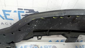 The lower front bumper absorber for a Toyota Venza 21-24 is worn and dented.