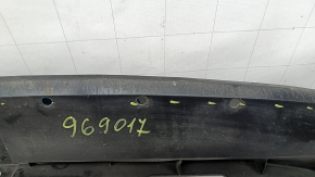 The lower front bumper absorber for a Toyota Venza 21-24 is worn and dented.