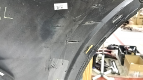 The bare rear bumper, upper part of the Audi Q5 80A 21-24, for parking sensors, black, pressed, torn, cracks, scratches, missing fragment
