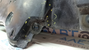 The front bumper guard for a Toyota Venza 21-24 is dented and worn.
