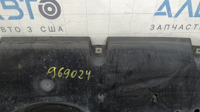 The front bumper guard for a Toyota Venza 21-24 is dented and worn.