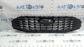 Ford Escape MK4 23-26 grille with emblem, non-factory hole, rusty emblem mounting bolts