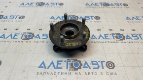 The front left hub of a Mazda CX-30 20-23 is rusty and loose.