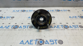 The front left hub of a Mazda CX-30 20-23 is rusty and loose.