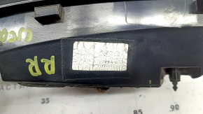 The right inner tailgate light of a Ford Escape MK4 23-26 has a melted housing and connection plug.