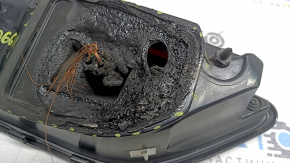 The right inner tailgate light of a Ford Escape MK4 23-26 has a melted housing and connection plug.