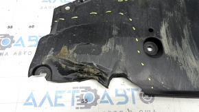 The front bumper guard for a Toyota Prius 50 19-22 is dented, torn, and missing a fragment.