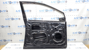The front left door of a Toyota Prius 50 19-22 is bare and has a bent corner.
