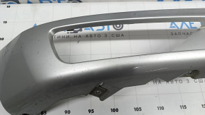 The right front bumper trim of a Volvo XC90 16-19 is cracked and chipped.
