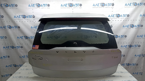 A bare tailgate with glass for a Volvo XC90, 16-22 tinted, silver 711, with a spoiler, brake light, wiper linkage, lighting strip and lock, and a worn spoiler.