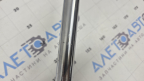 The front left shock absorber for a Ford Fusion mk5 13-20 is rusty and has dents on the rod.