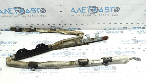 The right side curtain airbag for a Kia Sportage 2023-2026 is covered in soot, the squib is rusty, and it's melted.