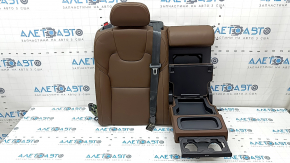 The backrest of the rear row, 2nd row, right, Volvo XC60 22-26, brown Nappa leather, with a headrest, with heating, an armrest and a central black belt, is dented, the chip mount is broken, scratches on the plastic