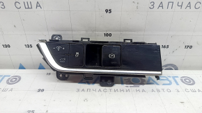 Left front panel button block for Kia Sportage 23-25 under electric trunk door, paint is melted, scratches