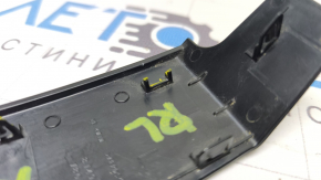 The left outer wing light cover for the Lexus NX200t NX300 NX300h 15-21 has broken fasteners.