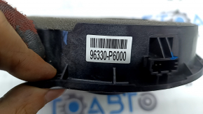 The rear right door speaker of the Hyundai Santa Fe 24-26 is dented.