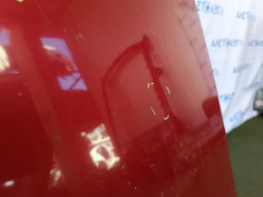 The metal roof of a Toyota Camry V40 is sawn off, with some bumps.
