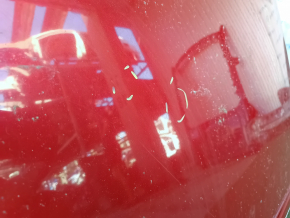 The metal roof of a Toyota Camry V40 is sawn off, with some bumps.