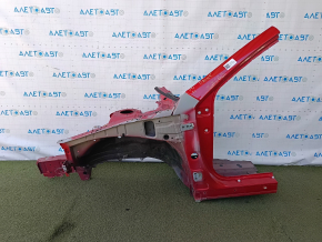 The front left quarter of a Toyota Camry v40 is sawn off, red, rusty, and painted.