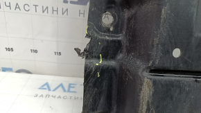 Mitsubishi Outlander 22-26 rear engine guard is dented and torn.