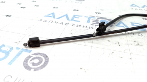 The insulation on the front hood release cable of a Volvo XC90 16-26 has dried out.