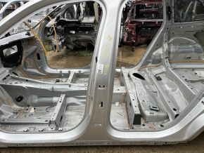 The central left body pillar of a Volvo XC90 16-26 is on the body, the threshold is dented