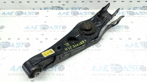 Lower control arm under the rear left spring, Hyundai Santa Fe 24-26