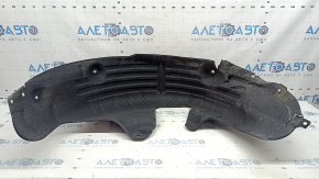 The rear left fender liner of a Hyundai Santa Fe 24-26 is torn and dented.