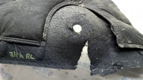 The rear left fender liner of a Hyundai Santa Fe 24-26 is torn and dented.