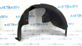 The rear left fender liner of a Kia Sportage 23-26 has a torn fastener.
