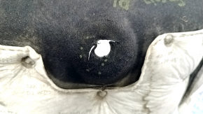 The rear left fender liner of a Kia Sportage 23-26 has a torn fastener.