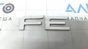 Santa Fe emblem on the Hyundai Santa Fe 24-26 trunk door, gray, bent