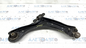 The lower front left control arm of a Kia Sportage 23-26 USA has a torn silent block.